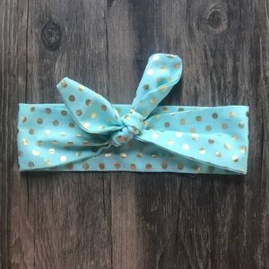 Baby girl polka dot headband.